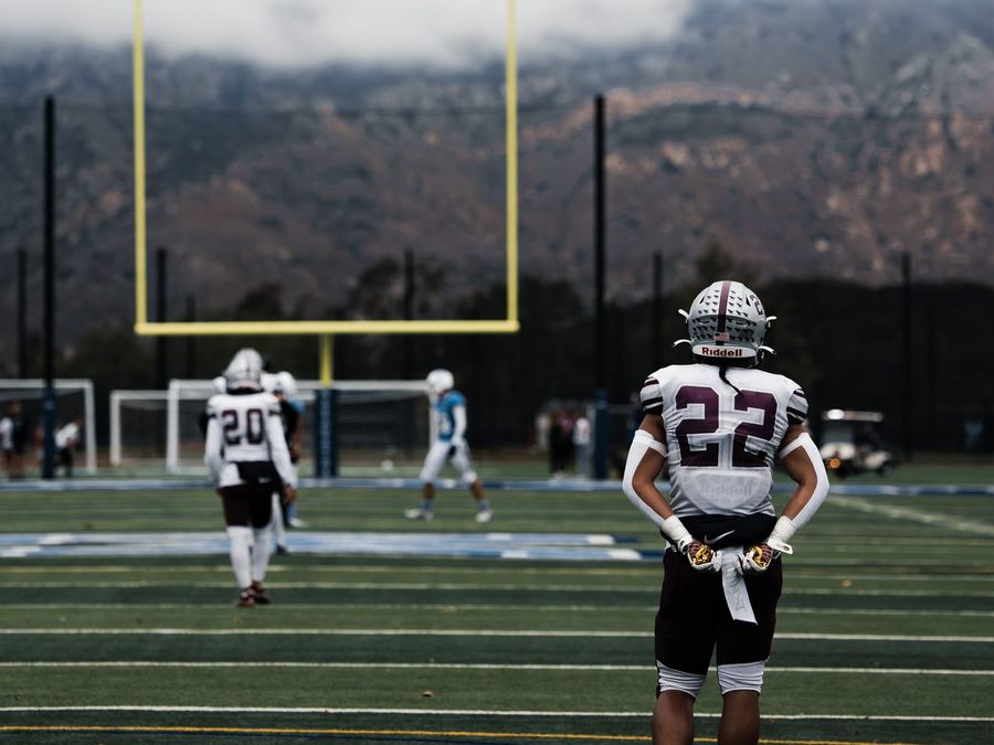 Kearny High School football player number 22 on the field under the goalposts